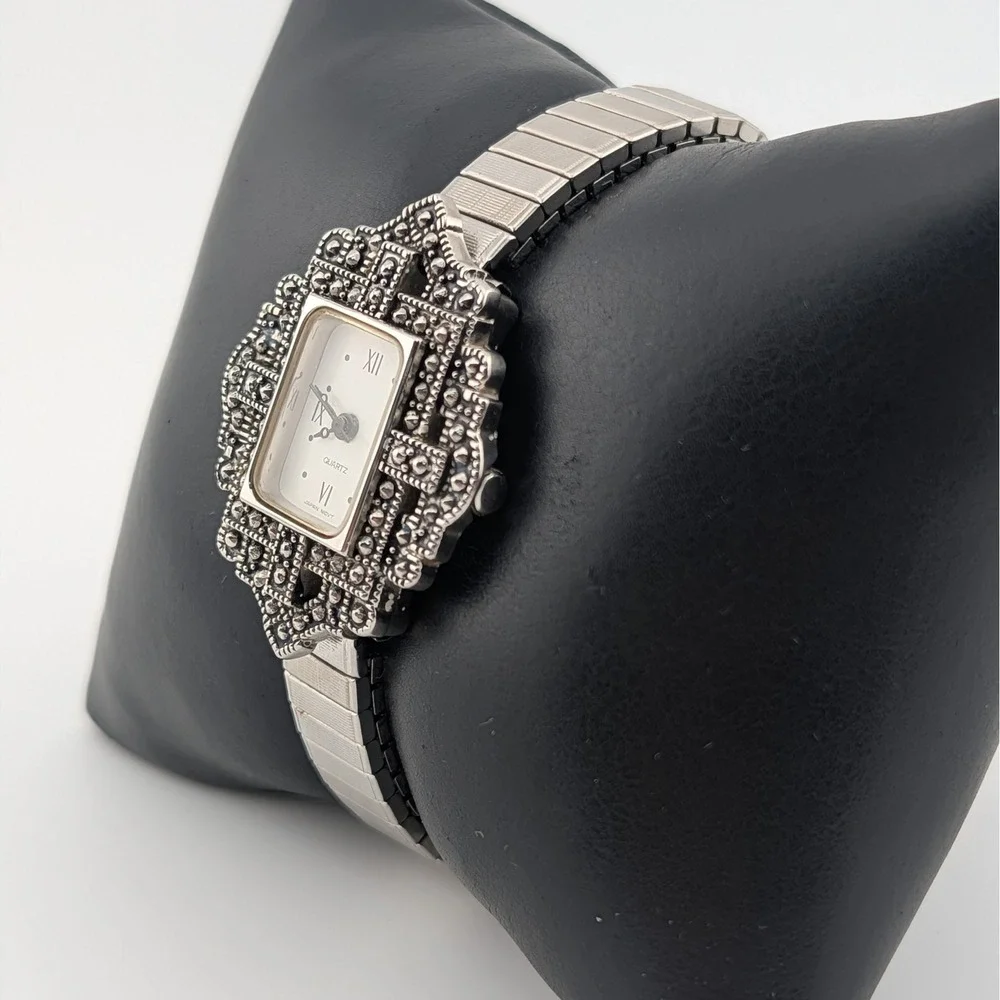 Avon silver tone
